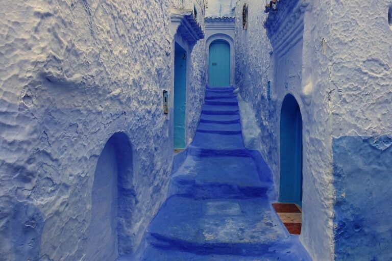 Blue-washed stairway and doorways in the old medina of Chefchaouen, Morocco
